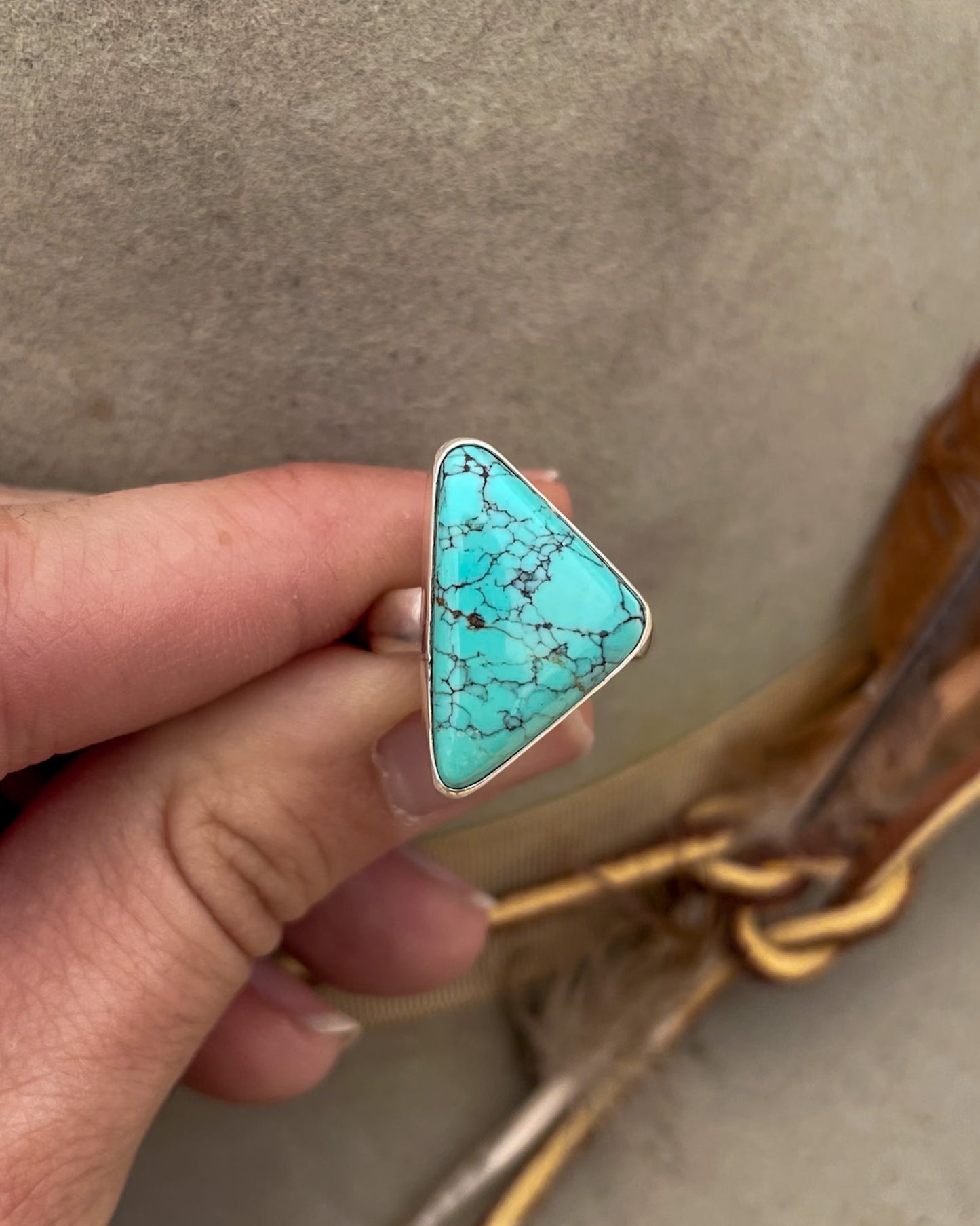 blue moon turquoise triangular stone ring with smooth bezel on chunky silver band