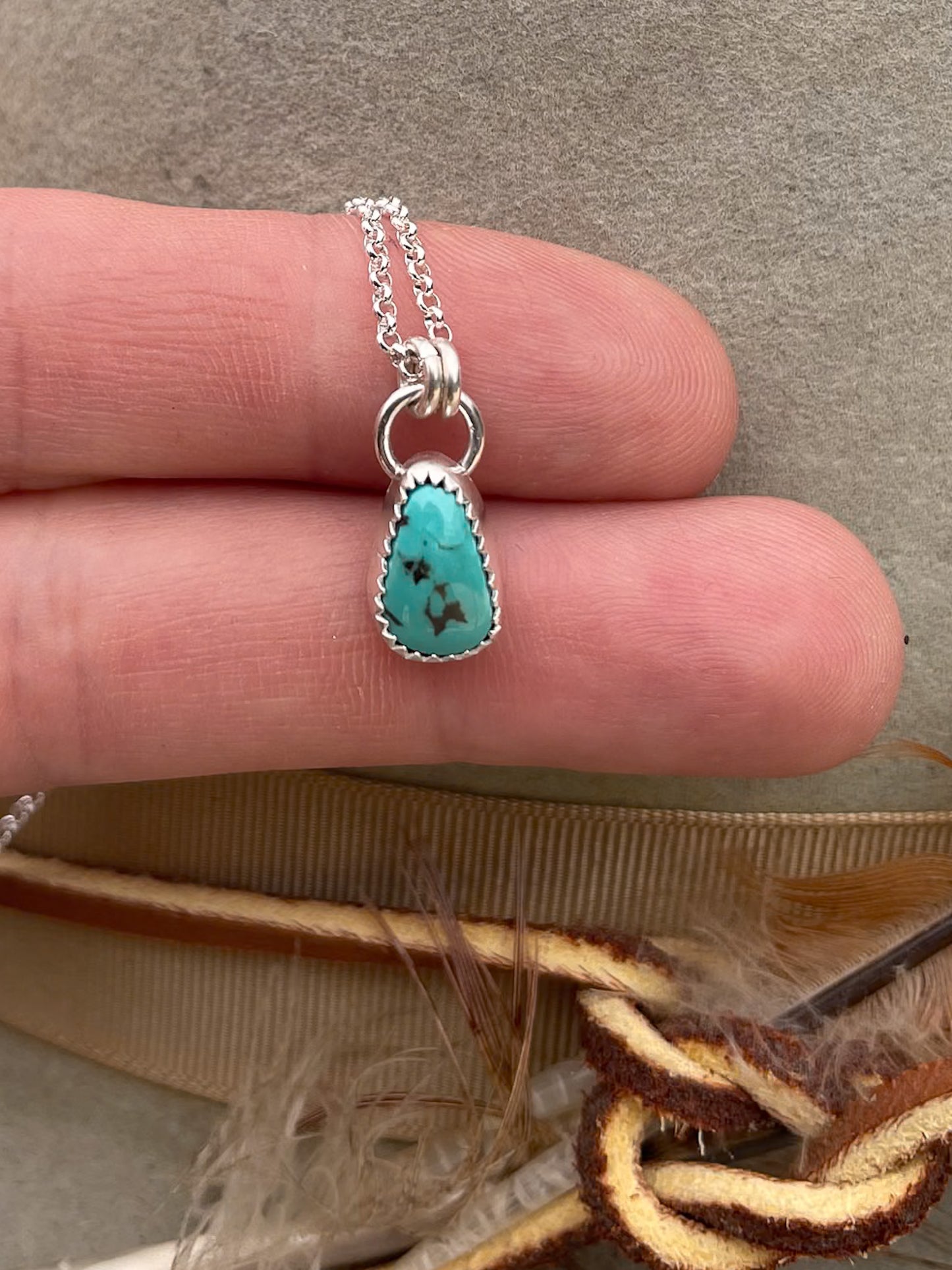 small carico lake turquoise teardrop pendant on dainty rolo chains