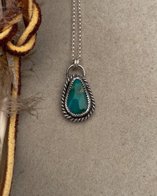 green turquoise teardrop pendant with twisted rope border on dainty rolo chain