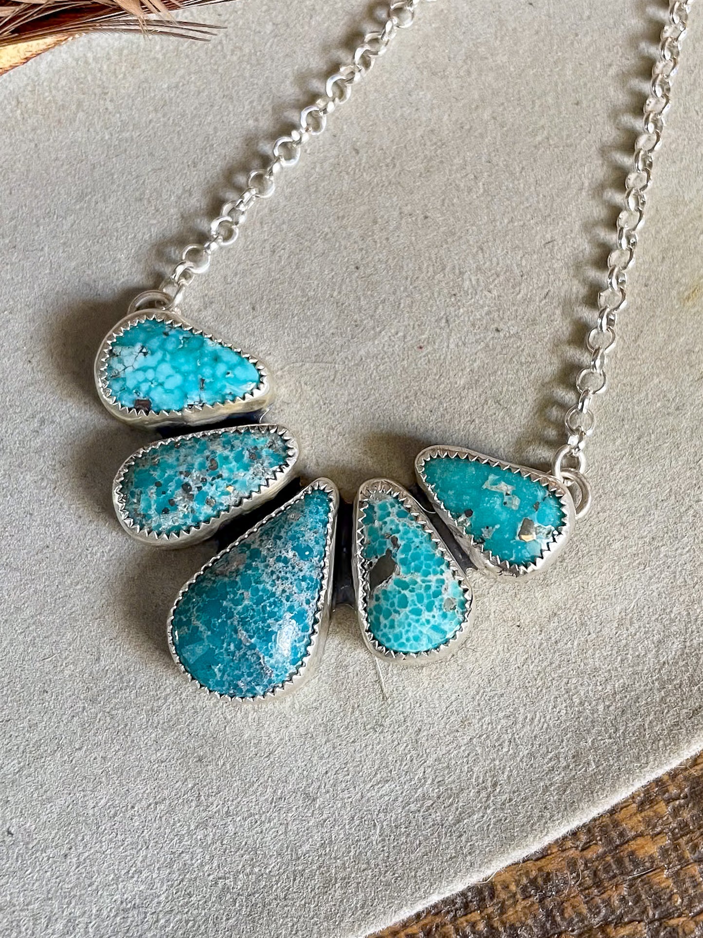 half cluster white water turquoise with five stones on rolo chain