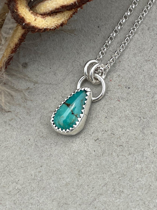 dainty dark seafoam teal carico lake turquoise necklace set in serrated bezel hung from double jump rings on dainty rolo chain