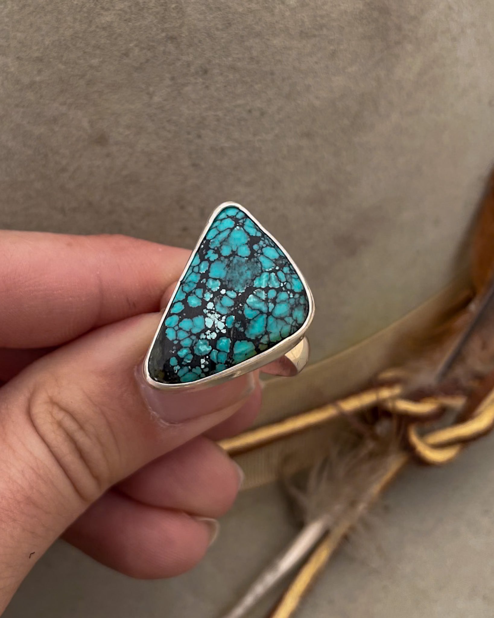 hubei turquoise triangular stone ring with smooth bezel on chunky silver band