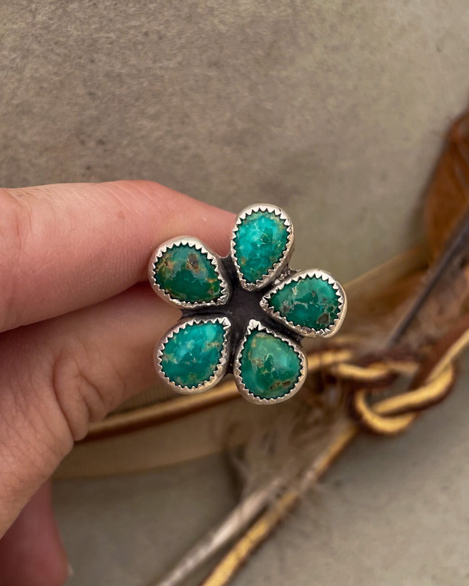 Playful one-of-a-kind Emerald Valley Turquoise flower ring. Chunky silver band, vibrant green stones in serrated bezels. Statement ring for everyday wear.