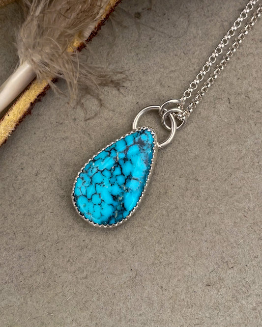 spiderweb kingman turquoise tearadrop pendant on dainty rolo chain