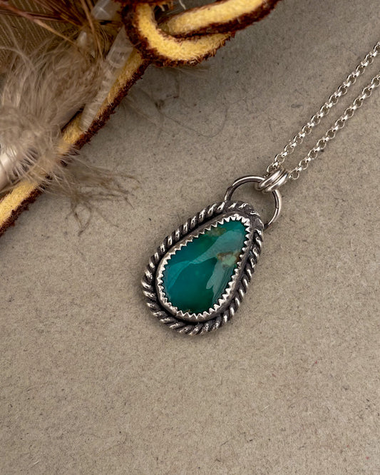 green turquoise teardrop pendant with twisted rope border on dainty rolo chain