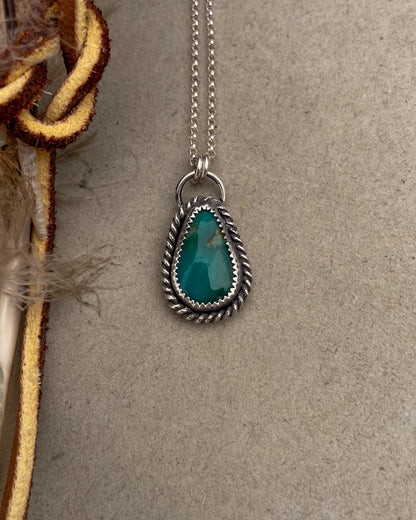 green turquoise teardrop pendant with twisted rope border on dainty rolo chain