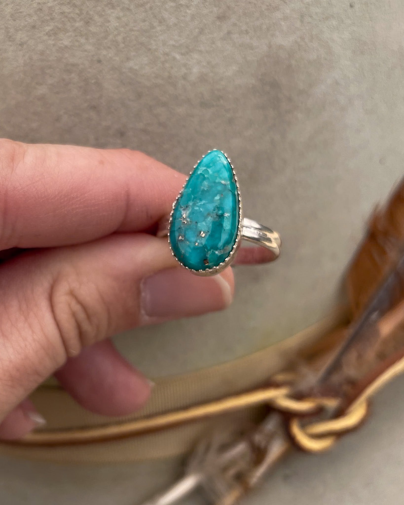 elongated pear white water turquoise ring on double half round band