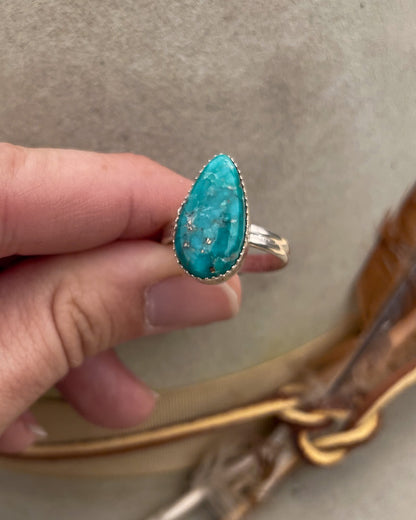 elongated pear white water turquoise ring on double half round band