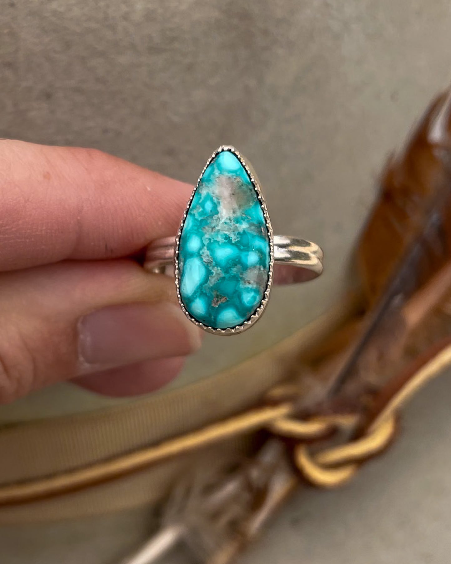 elongated pear white water turquoise ring on double half round band