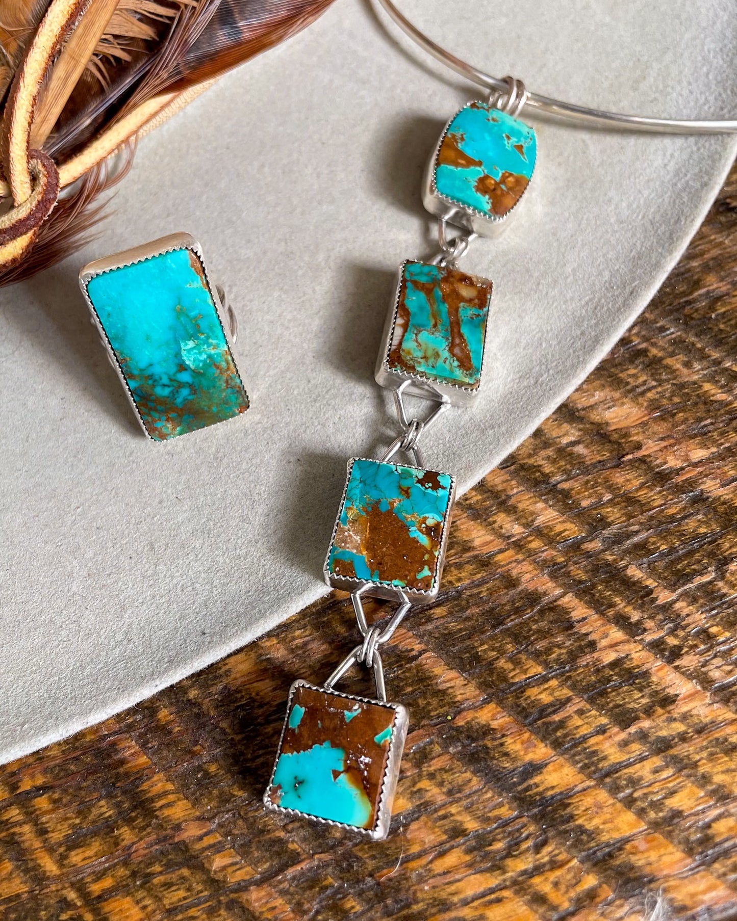 four stone pilot mountain turquoise pendant with rectangular stones connected in a row with matching rectangular ring