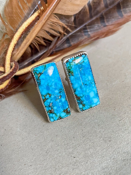 bright blue turquoise mountain bar cufflinks in serrated bezels 