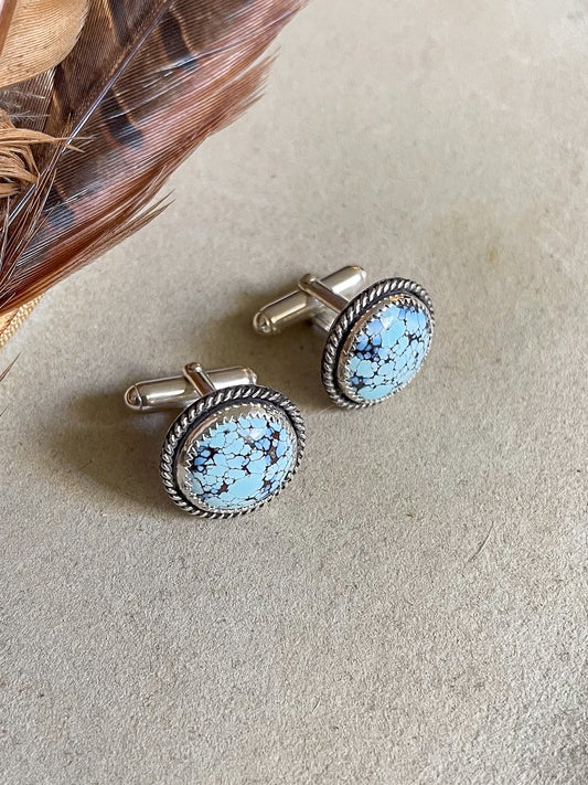 Pair of cufflinks with round golden hills turquoise turquoise stones and delicate rope border