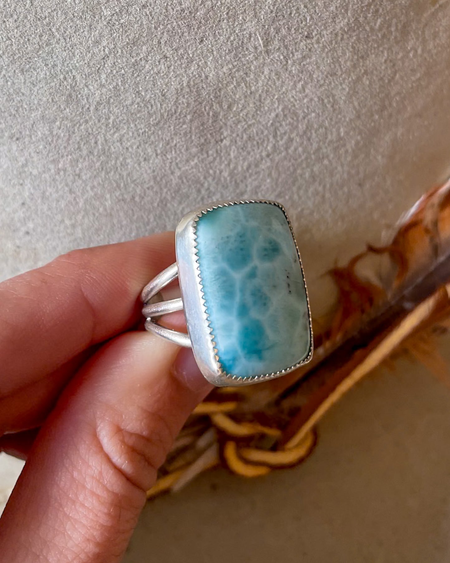 dominican larimar ring in silver bezel with split silver shank band