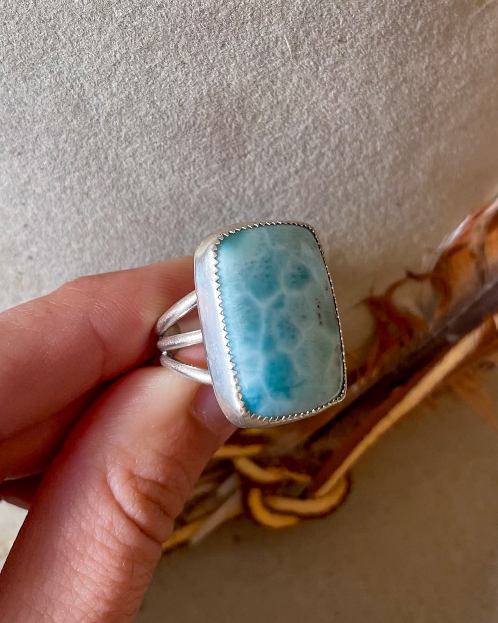dominican larimar ring in silver bezel with split silver shank band