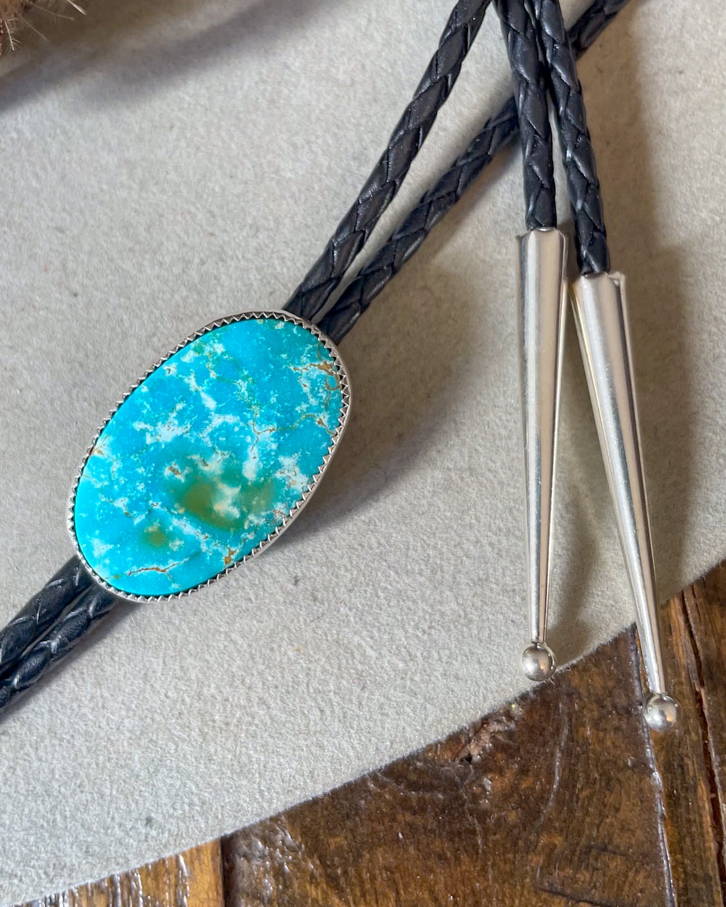 sierra bella bolo with black leather cord and silver tips