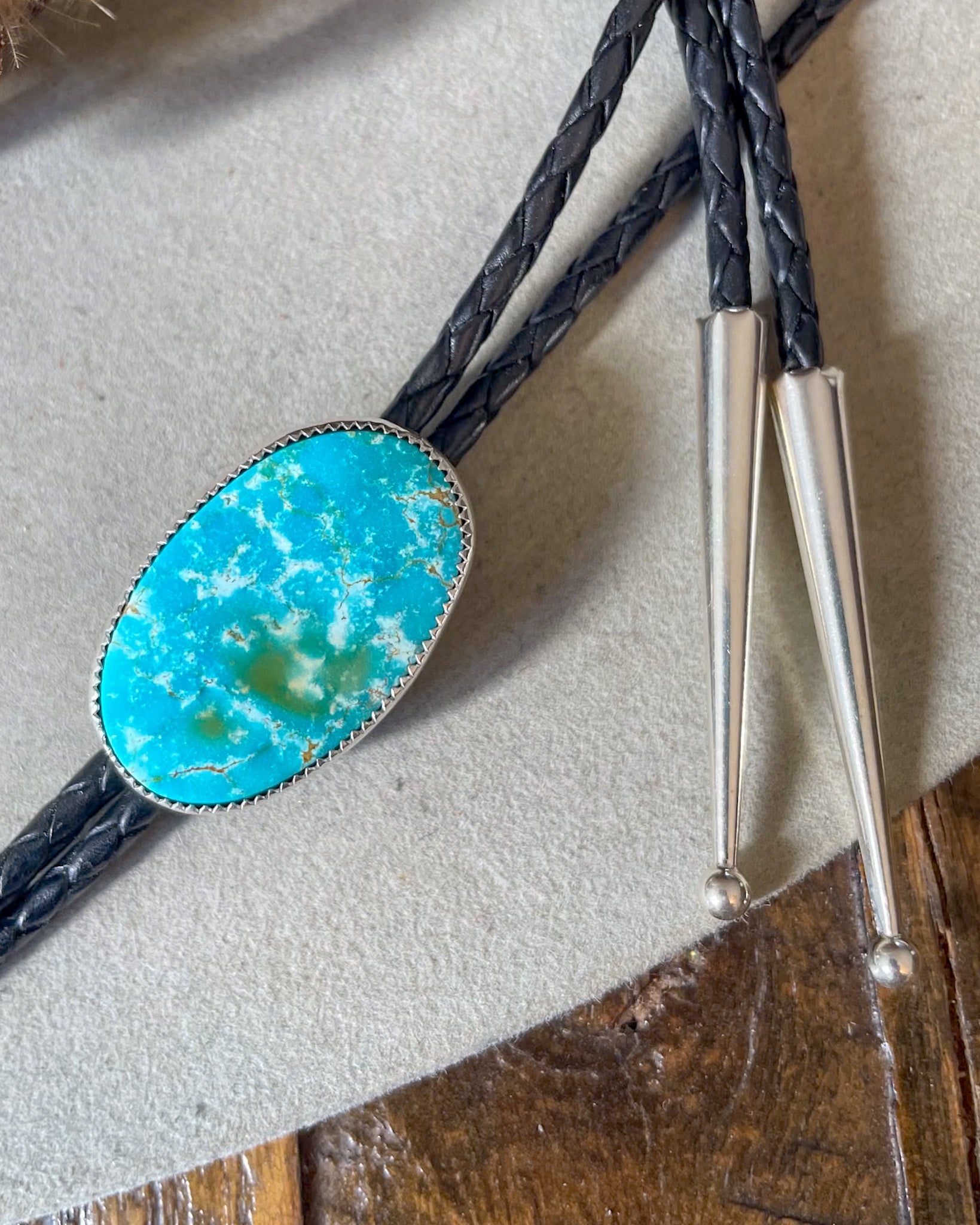 sierra bella bolo with black leather cord and silver tips