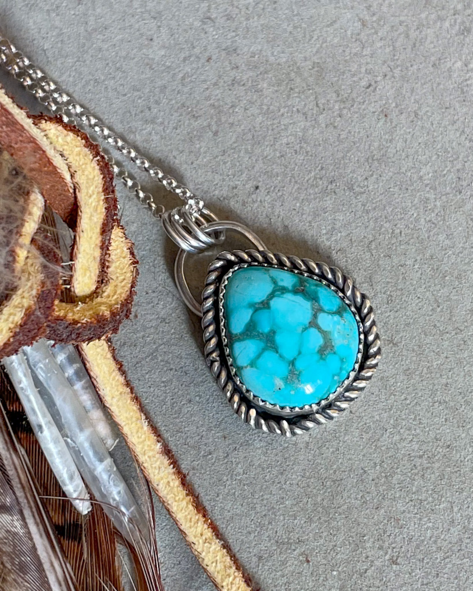 white water turquoise pendant with rope border